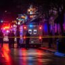 Police and emergency vehicles respond to mass shooting scene on Sixth Street in Austin Texas at night
